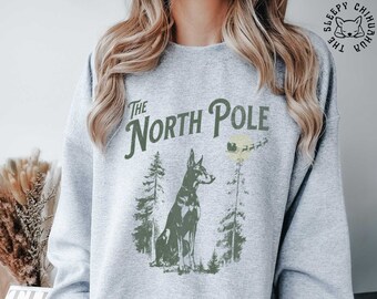 Doberman Christmas Season Sweatshirt, North Pole Vintage Style Holiday Doberman Pinscher Lover Shirt, Doberman Dog Owner Xmas Festive Gift