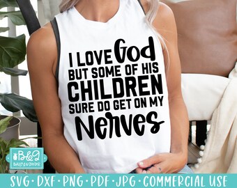 May include: White tank top with the text "I LOVE God BUT SOME OF HIS CHILDREN SURE DO GET ON MY Nerves" in bold black letters. The tank top is sleeveless and has a scoop neck. The bottom of the image shows the words "SVG • DXF • PNG • PDF • JPG • COMMERCIAL USE".
