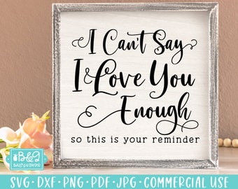 May include: A white sign with black text that reads "I Can't Say I Love You Enough so this is your reminder". The sign is in a wooden frame.