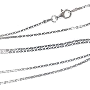 May include: A silver chain necklace with a lobster clasp fastening. The chain is made of small, linked squares.