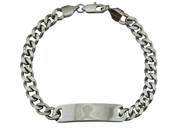 May include: A silver chain bracelet with a rectangular tag. The tag is blank and can be engraved.