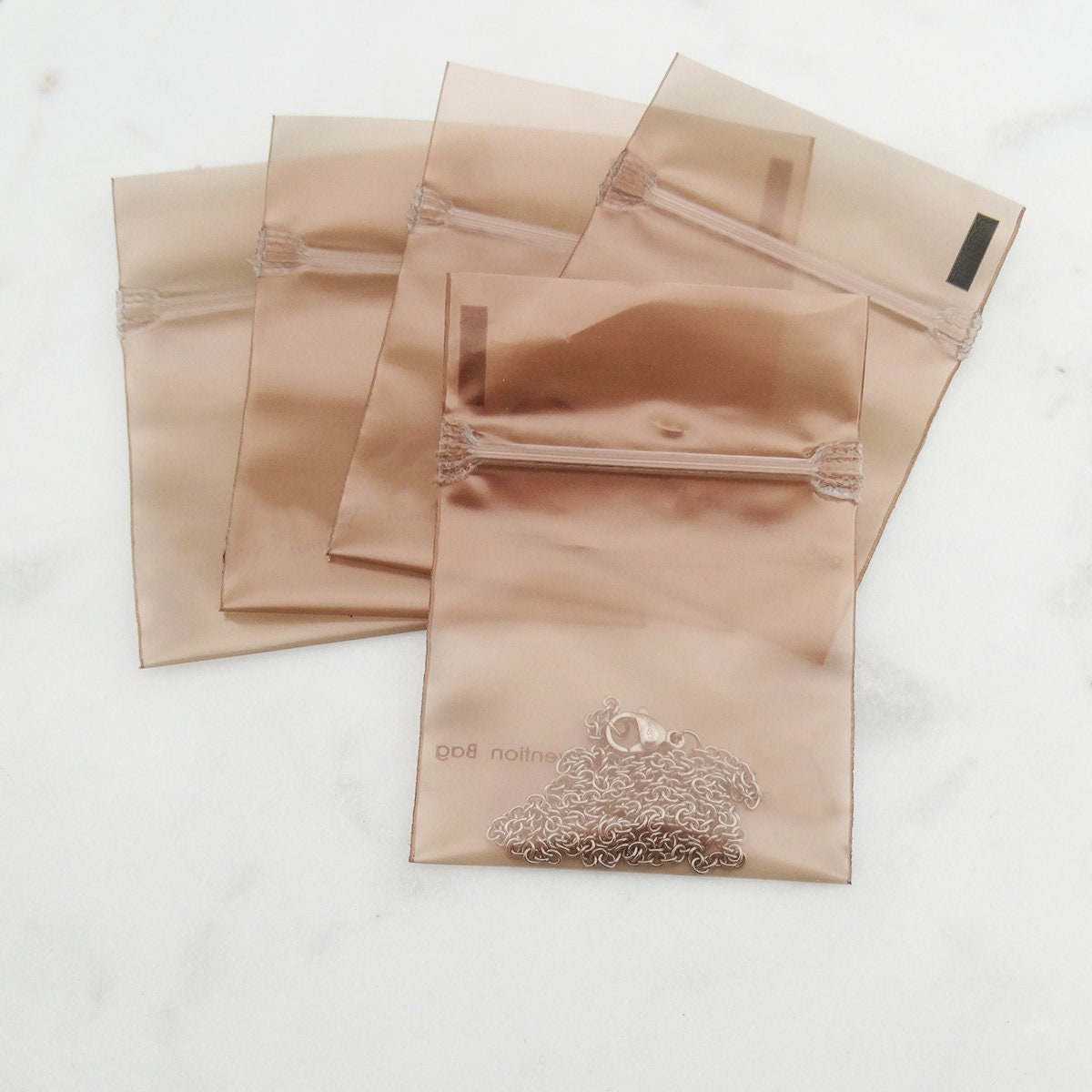 100 Anti-Tarnish Zip Bags 2x3 Inches - Protect Jewelry, Coins, Silver, Gold