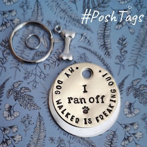 May include: A selection of pet tags and accessories. The tags are silver-coloured and stamped with the words "I ran off" and "My dog Walker is freaking out." A silver bone-shaped charm and two metal rings are also included.