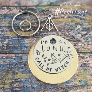 May include: Silver charm with a crescent moon, stars, a witch's hat, and a wand. The charm says "I'm Luna Call My Witch".