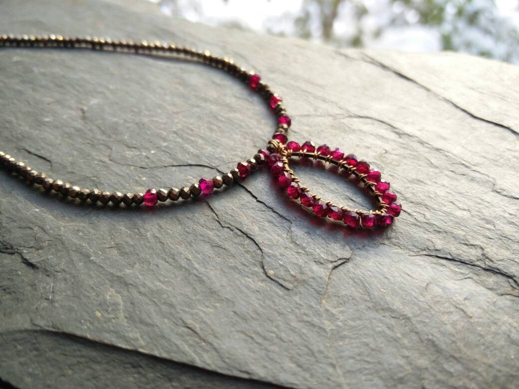 Mozambique and micro faceted Pyrite wire wrapped necklace