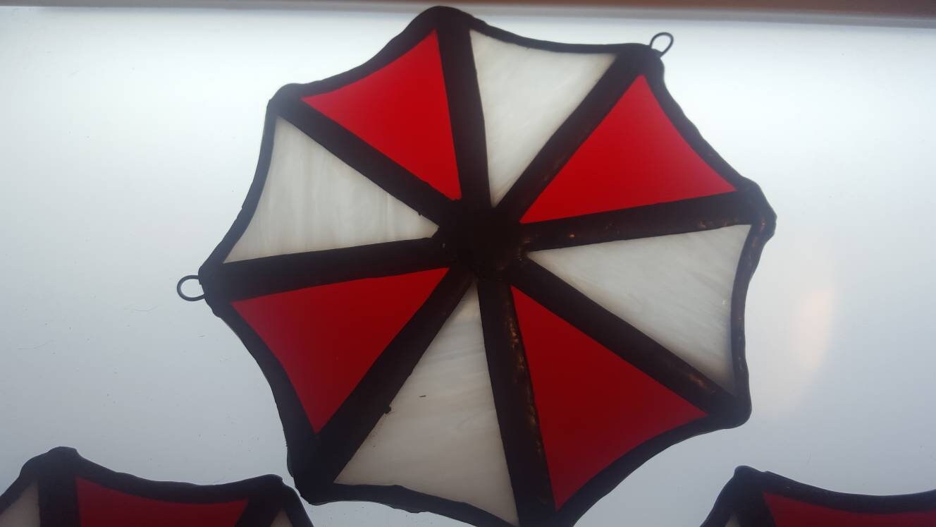 Umbrella Corp Logo by bainerom  Resident evil movie, Umbrella