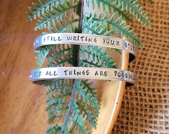 With God all things are possible | God is still writing your story | Hand stamped aluminum