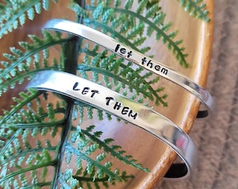 Let them cuff | Hand stamped aluminum