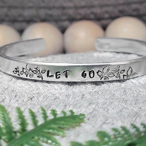 Let go cuff | Hand stamped aluminum