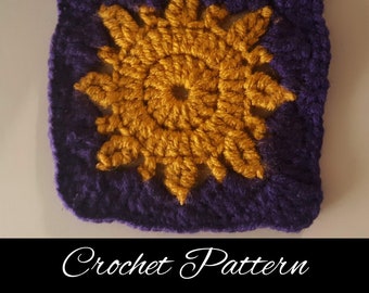 May include: Crochet pattern for a purple square with a yellow flower in the center. The flower has 8 petals and a small circle in the center.