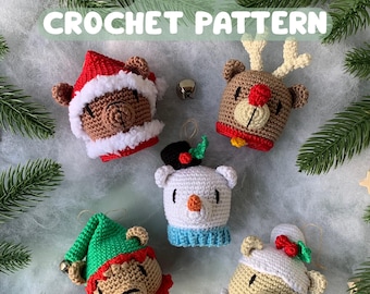 May include: A collection of five crocheted bear ornaments, each with a unique holiday theme. One wears a Santa hat, another a reindeer design, and others are dressed as an elf, snowman, and a bear with a holly berry. The text reads "5 IN 1 CROCHET PATTERN" and "THE BEARBLES."