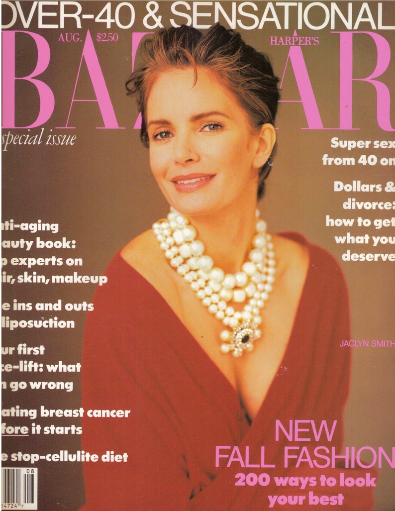 May include: A magazine cover featuring a woman with short brown hair wearing a red dress and a pearl necklace. The magazine is titled "Harper's Bazaar" and the cover text reads "Over-40 & Sensational" and "New Fall Fashion 200 ways to look your best".