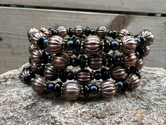 Copper Pumpkin & Black Black Bead Memory Wire Bracelet