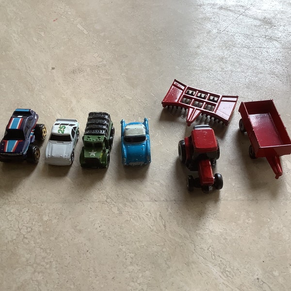 Seven Vintage Micro Machine Vehicles Including a Tractor/Plow/Wagon