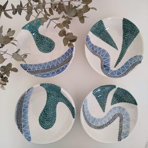 Modern soup and pasta plates handmade and decorated with abstract and geometric patterns, contemporary tableware inspired by the nature