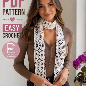 May include: A white, open-weave crochet scarf with a floral pattern is shown. The image includes text: "PDF PATTERN," "EASY CROCHET," and "INSTANT DOWNLOAD." The scarf is worn by a person wearing a brown long-sleeve top.