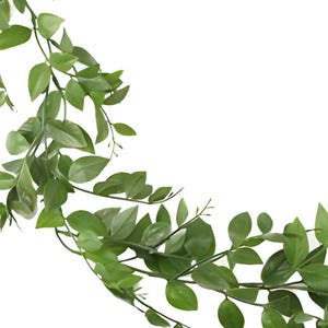 May include: A long garland of artificial green leaves, perfect for adding a touch of greenery to your home decor.