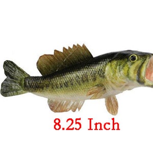May include: A detailed, realistic sculpture of a largemouth bass, with open mouth. The fish is primarily green and yellow with dark stripes. The sculpture is 8.25 inches long.