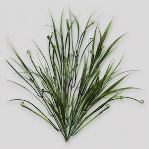May include: A decorative artificial grass arrangement. The faux plant features long, slender green blades with curled tips and small, round accents. The arrangement is set against a plain white background, highlighting the vibrant green color of the faux grass.