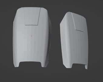 May include: Two white, plastic, rectangular-shaped objects with a rounded top and a flat bottom. The objects have a small rectangular opening on the top.