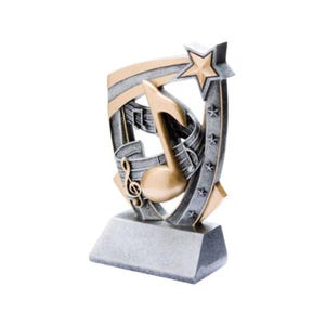 May include: A silver and gold musical award trophy with a star and musical notes. The trophy is on a silver base.