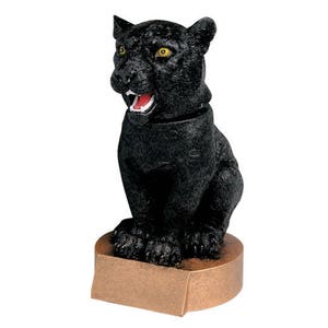 May include: A black panther figurine with a bronze base. The panther is sitting with its mouth open and its eyes are yellow.