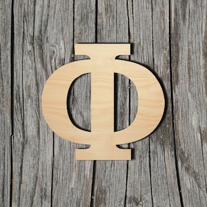 May include: A wooden cutout of the Greek letter Phi, a symbol often associated with philosophy and mathematics. The letter is made of light-colored wood and is set against a rustic wooden background.