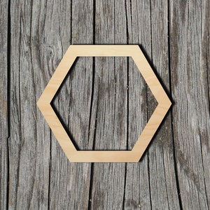 May include: A wooden hexagon frame against a weathered wood background.