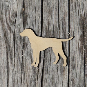 May include: A wooden cutout of a dog silhouette on a weathered wood background.