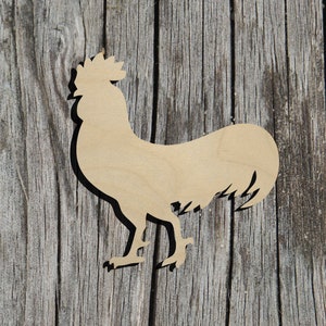 May include: A wooden cutout of a rooster silhouette against a weathered wood background.