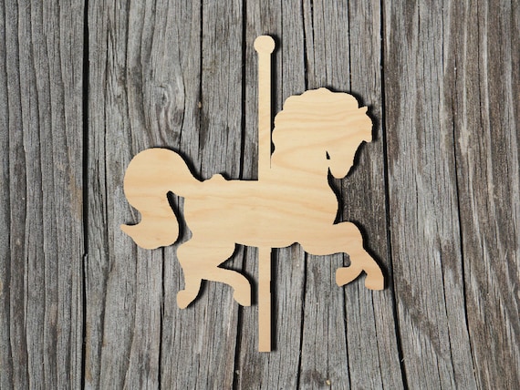 unfinished wooden carousel horses