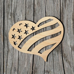 May include: A wooden heart-shaped cutout with the design of the American flag. The heart is painted in red, white, and blue.