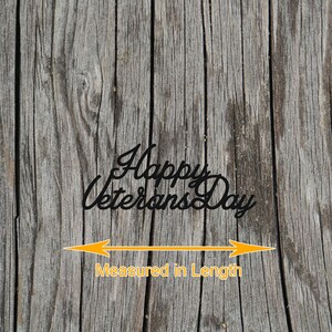 May include: A weathered wooden background with the text "Happy Veterans Day" in black lettering. An orange arrow points to the length of the text, with the words "Measured in Length" below.