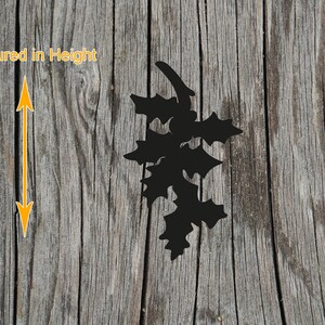 May include: A black silhouette of a holly leaf sprig with jagged edges. To the left, a yellow double-headed arrow indicates the vertical orientation with the text Measured in Height written in yellow above the arrow.