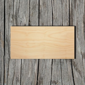 May include: A light brown wooden sign with a smooth surface. The sign is rectangular and has a natural wood grain pattern.