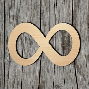 May include: A wooden infinity symbol cutout, with a smooth, light brown finish. The symbol is placed against a weathered wood background.