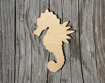 May include: A wooden cutout of a seahorse, a popular nautical theme for home decor and crafts.