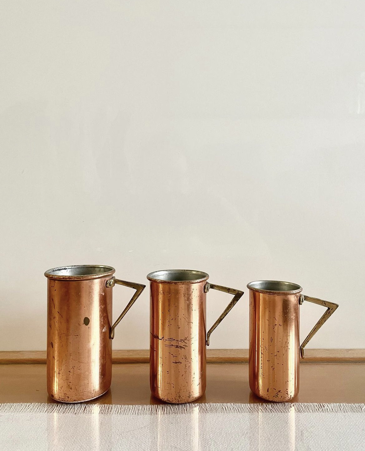 Vintage 5 Piece Copper/Brass Tall Liquid Measuring cups & Wall