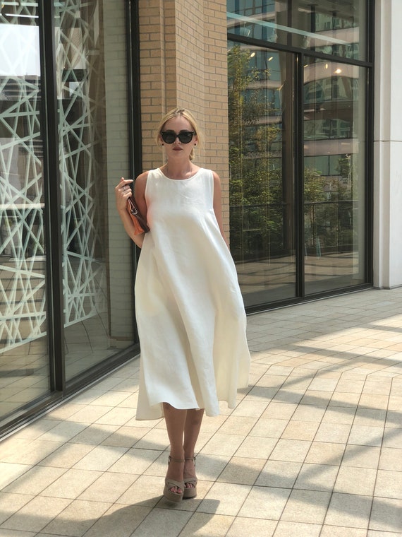 white linen dress with pockets