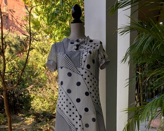 Label says "Available" Dark Navy and White Polka Dot Abstract Pattern Dress
