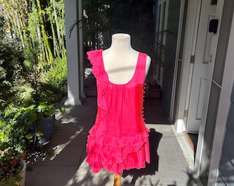 Hot pink ruffled mini by London designer Cocoribbon