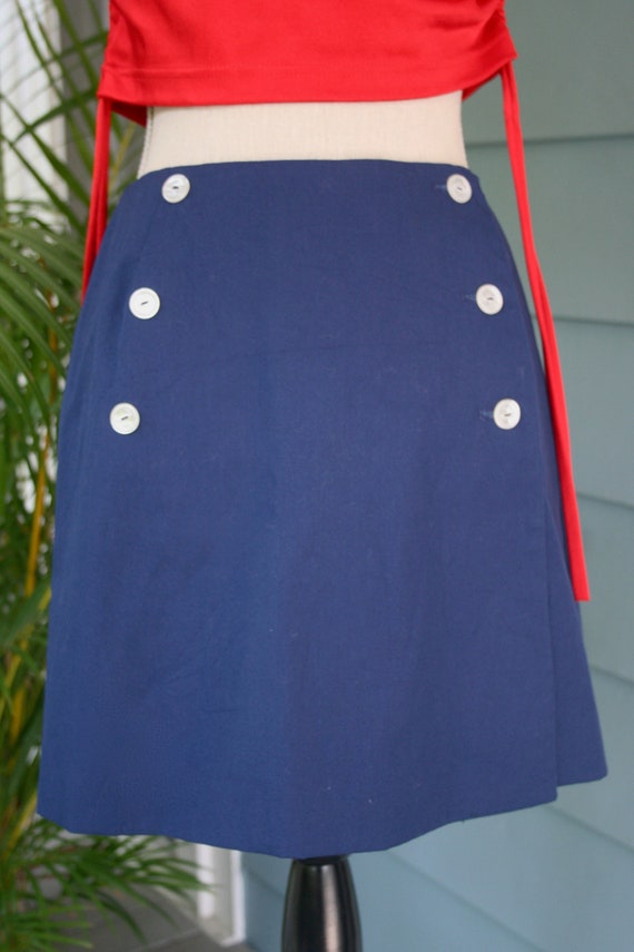Blue cotton vintage button-front 60s mini-skirt.