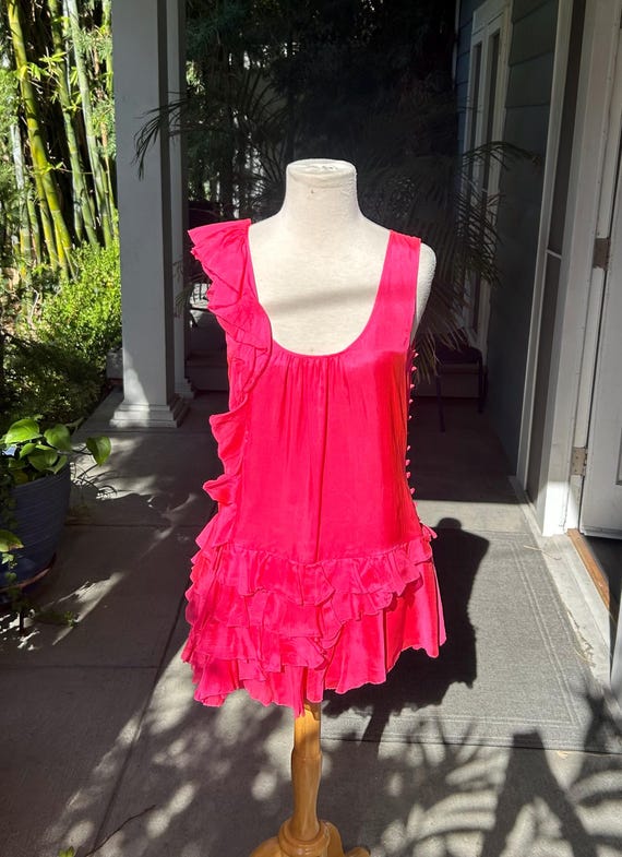 Hot pink ruffled mini by London designer Cocoribbon