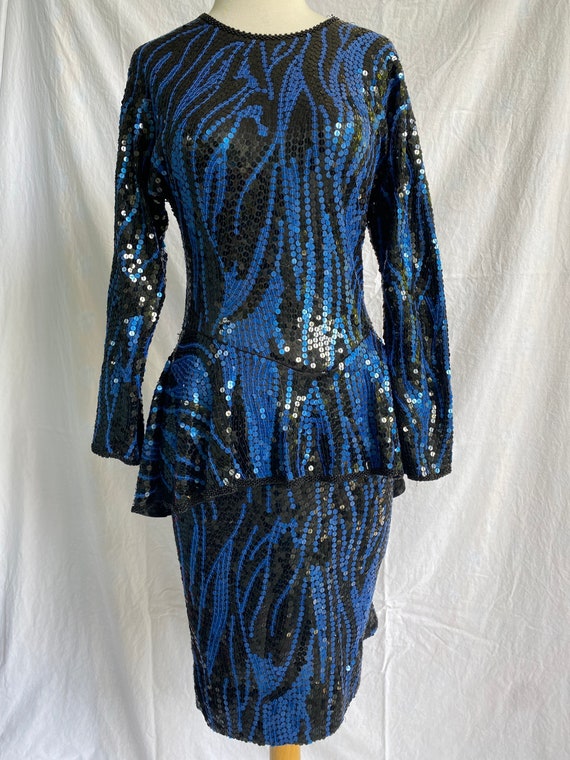 cassini dress in blue Cassini Lemon Print Dress  Sapphire Boutique