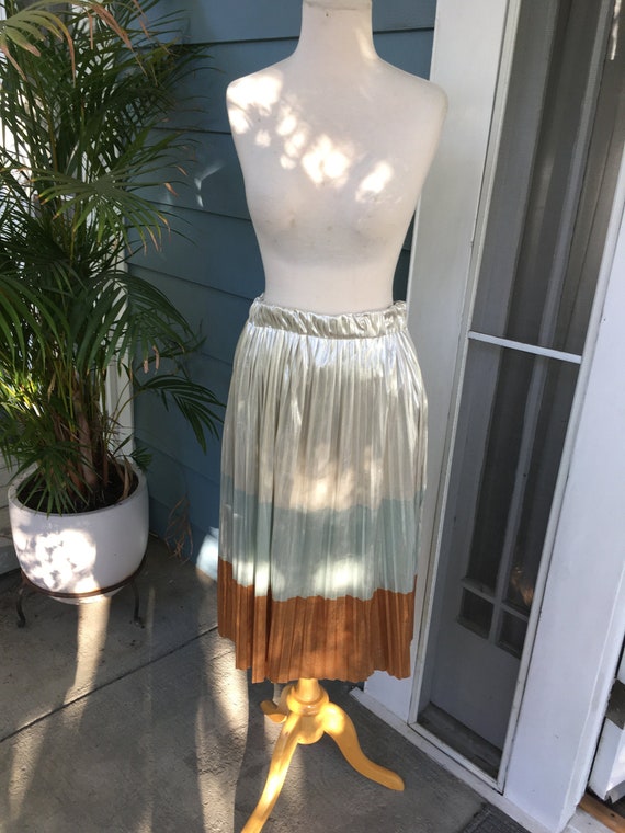 Shimmery pleated silver skirt