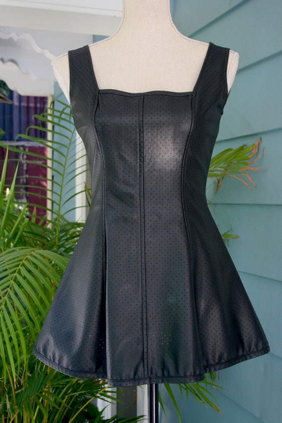 Perforated black Alaïa-esque vinyl skater dress