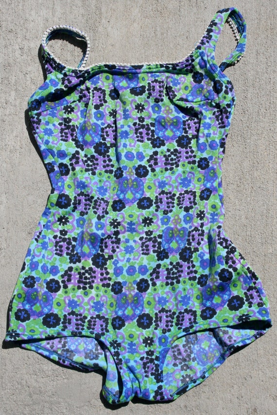 Blue and green flower-print Gucci-style swimsuit.