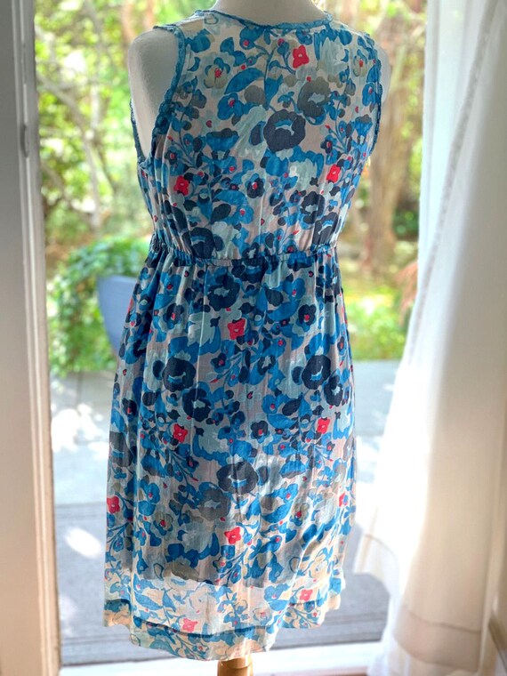 Collective Concepts Designer Sleeveless, Light and Airy Blue Floral Summer Dress. Collective Concepts Designer Sleeveless, Light and Airy Blue Floral Summer Dress.