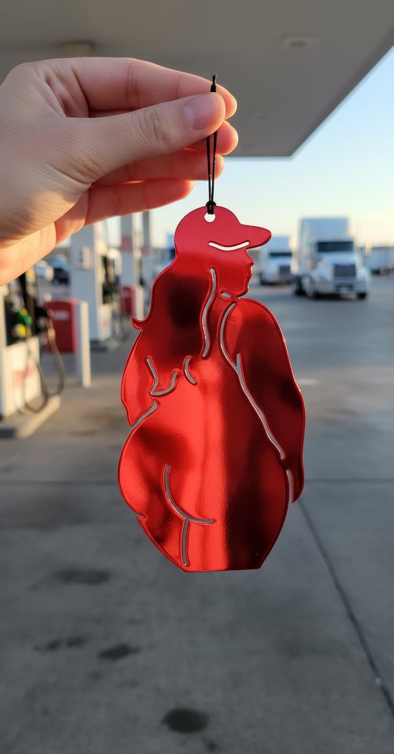 Laser-cut metal 'Big Mama Trucker #1' ornament — the kind of hilariously specific gift that makes someone feel deeply seen.