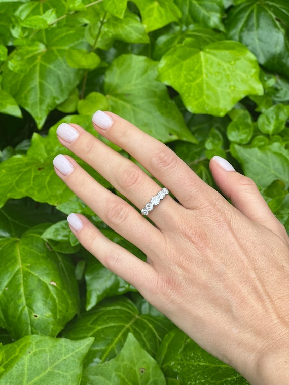 A vintage 18k 5 stone diamond ring